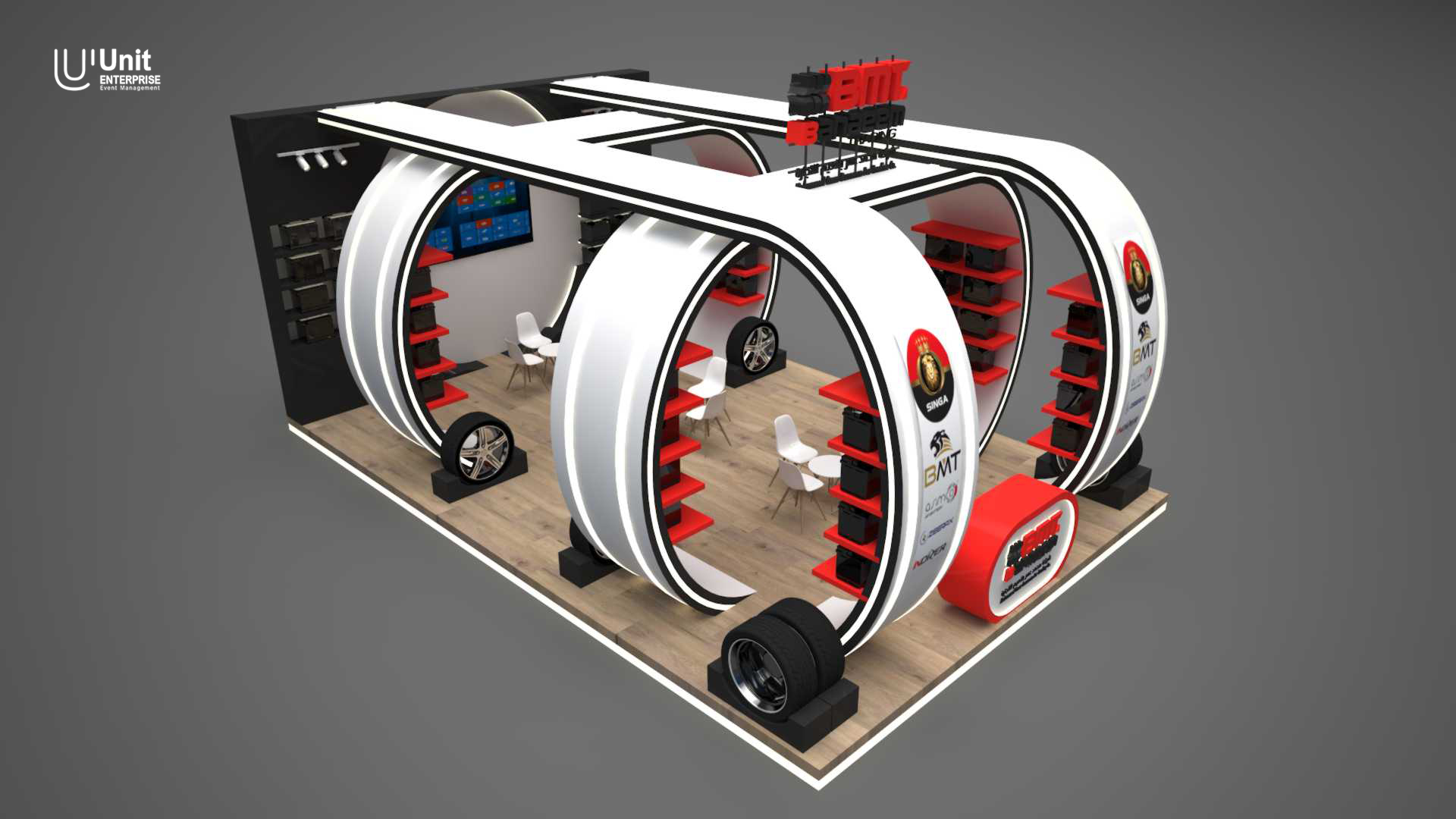 تصميم جناح عرض بتكوين دائري مميز لشركة BMT، يعرض شعارات الشركاء وإطارات السيارات.